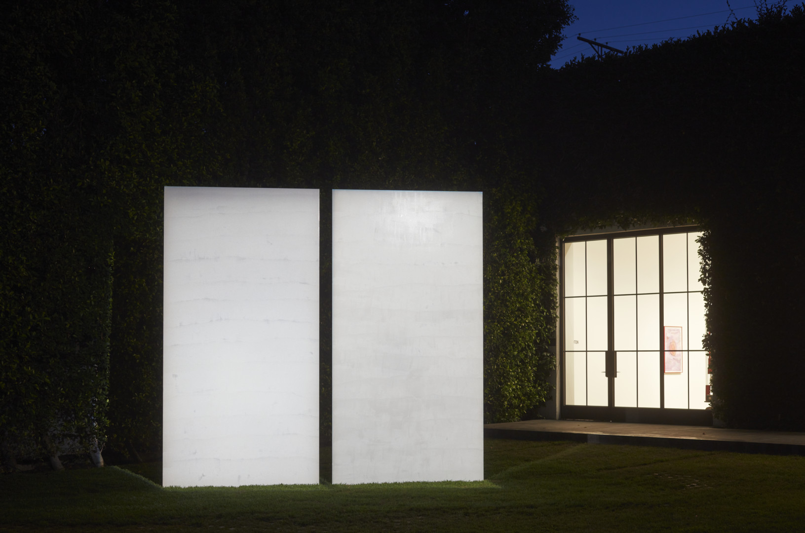 Mary Corse, Untitled (Beams), 2019. Powder coated stainless steel with microspheres.