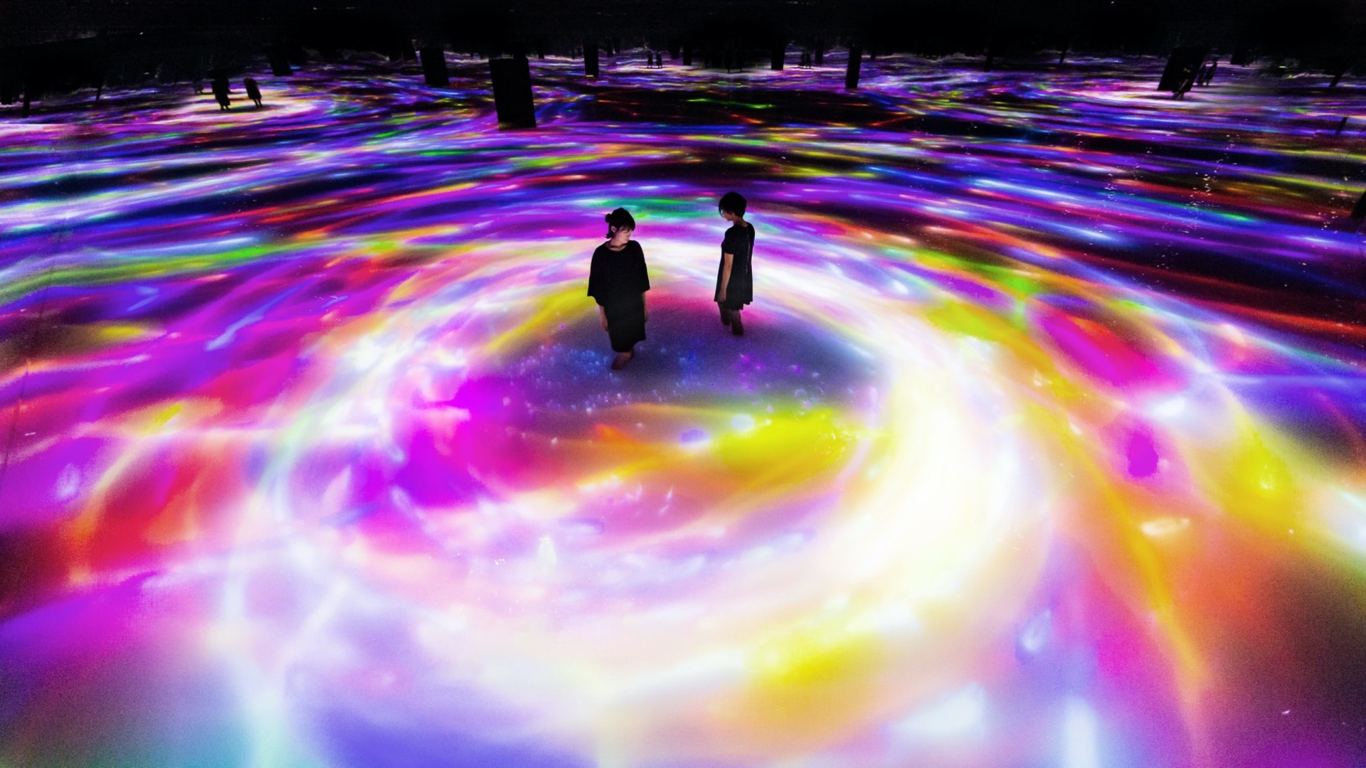 teamLab, Drawing on the Water Surface Created by the Dance of Koi and People - Infinity, 2016-2018. Interactive Digital Installation